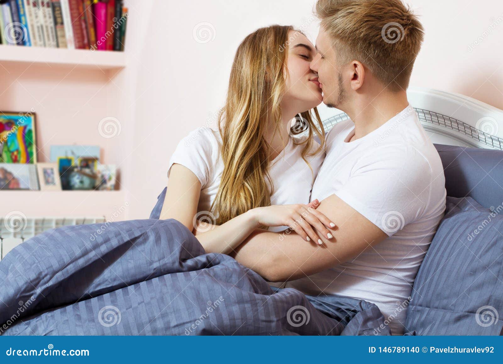 Beautiful Loving Couple Kisses and Hugging on Bed in the Morning ...