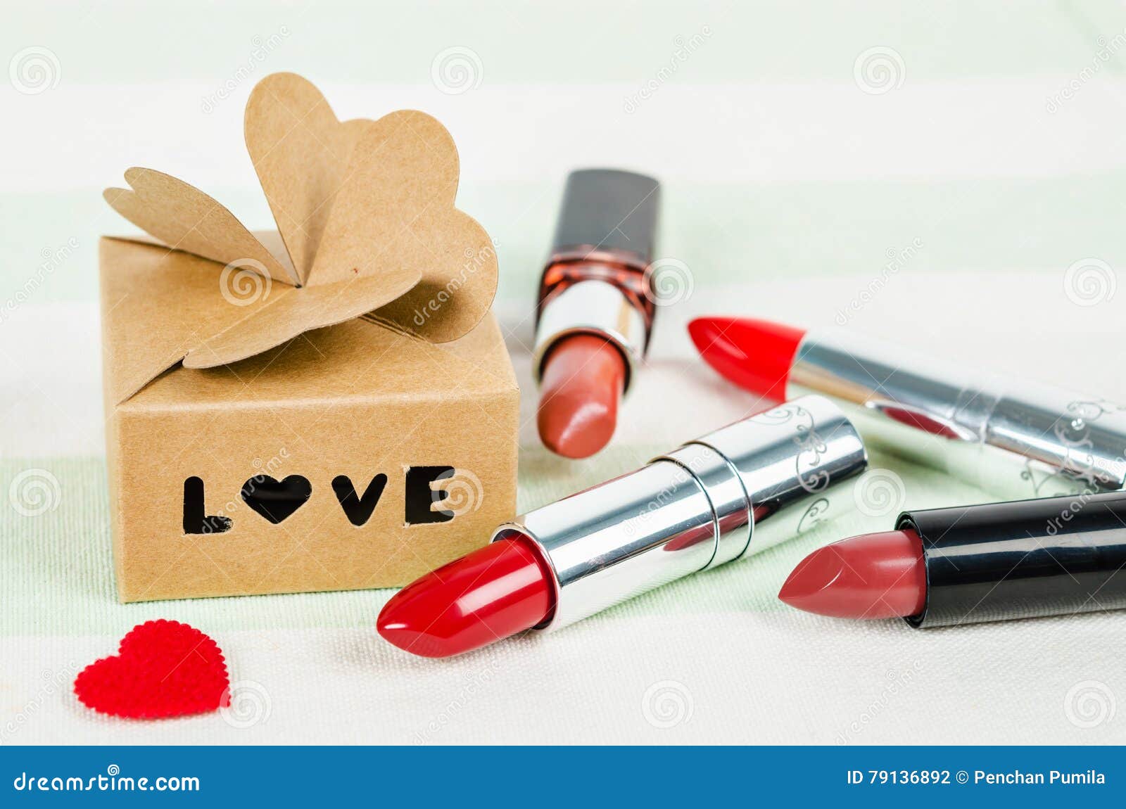 Beautiful Luxury Red Lipstick with Love Box Gift. Stock Photo Image