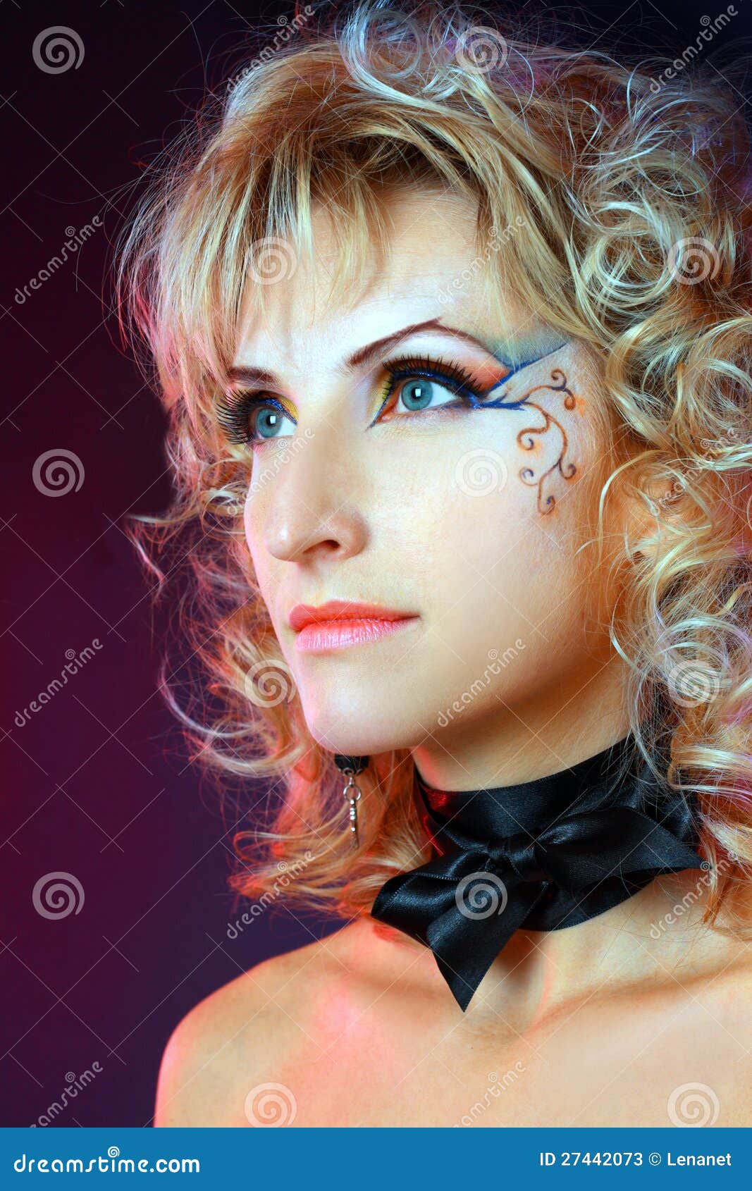 Beautiful makeup face art close up. Gorgeous female model beautiful woman with perfect art make up