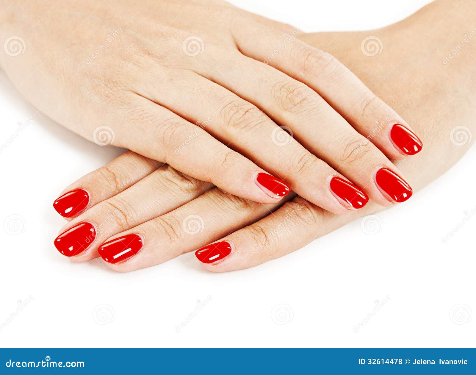 beautiful manicured woman's hands with red nail polish
