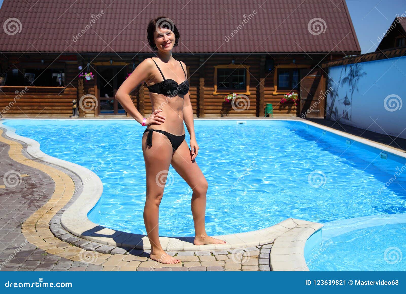 Woman in the Pool. Beautiful Woman in Pool Stock Image - Image of outdoors,  beautiful: 123639821