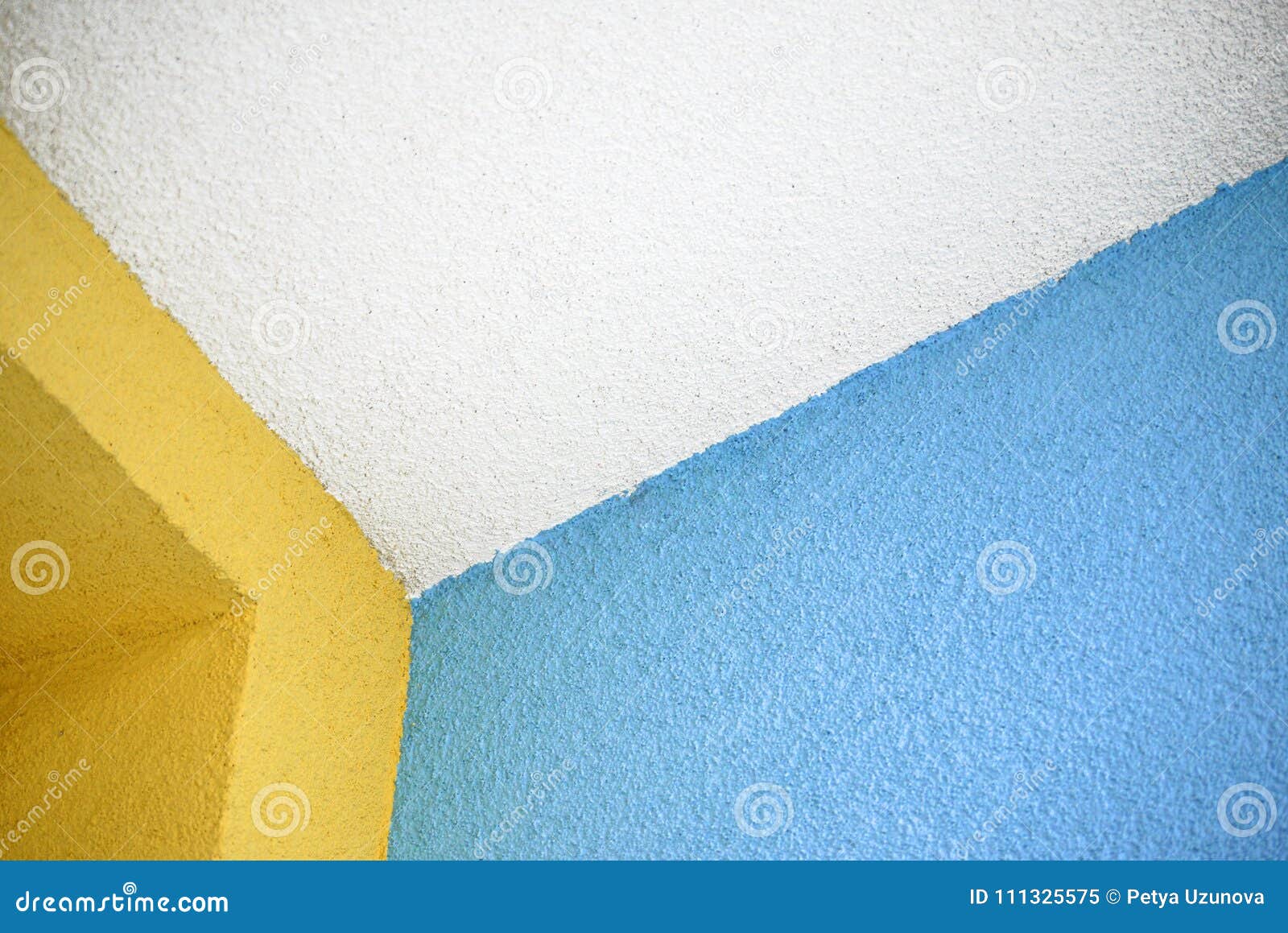 White Ceiling Edge With Colorful Blue And Yellow Walls