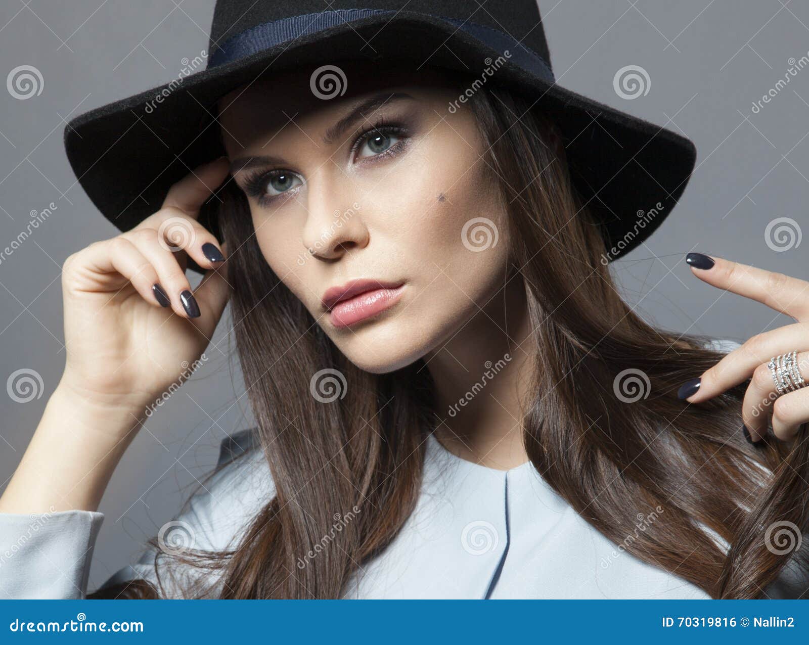 Beautiful Model in a Hat with Beautiful Makeup and Blue Dress Stock ...