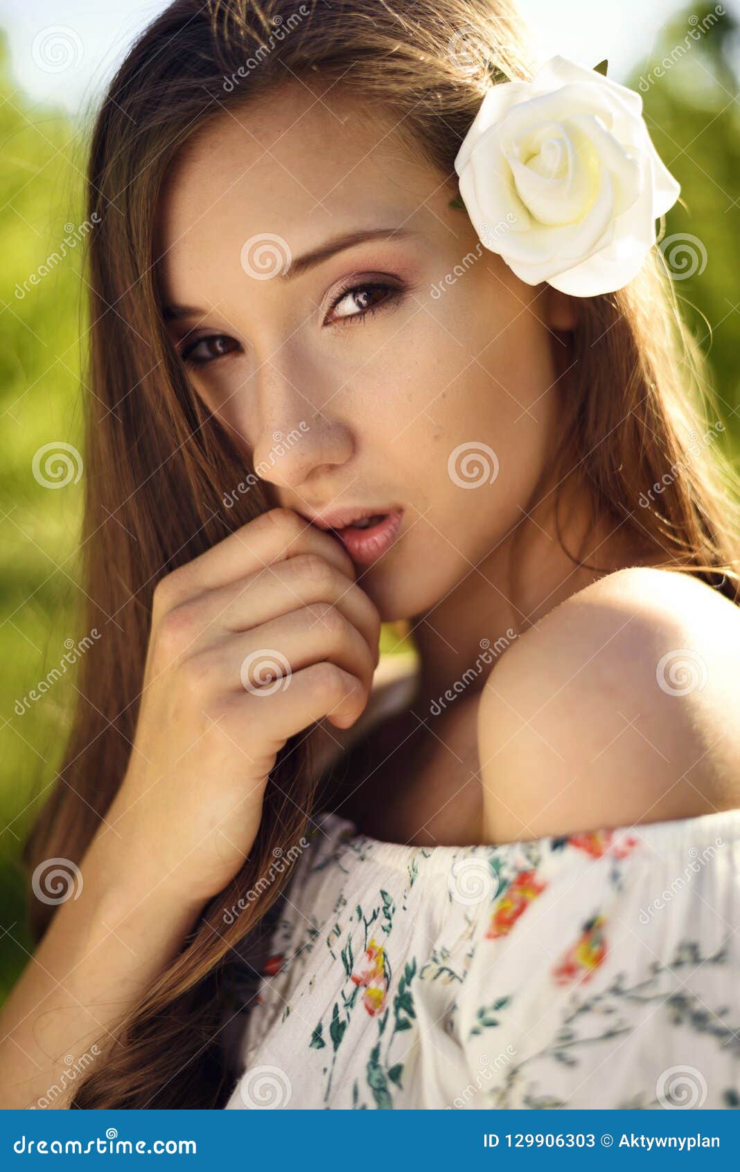 Beautiful Model with White Rose As Hair Accessory Posing in a Park Touching  Her Lips. Stock Image - Image of attractive, garden: 129906303