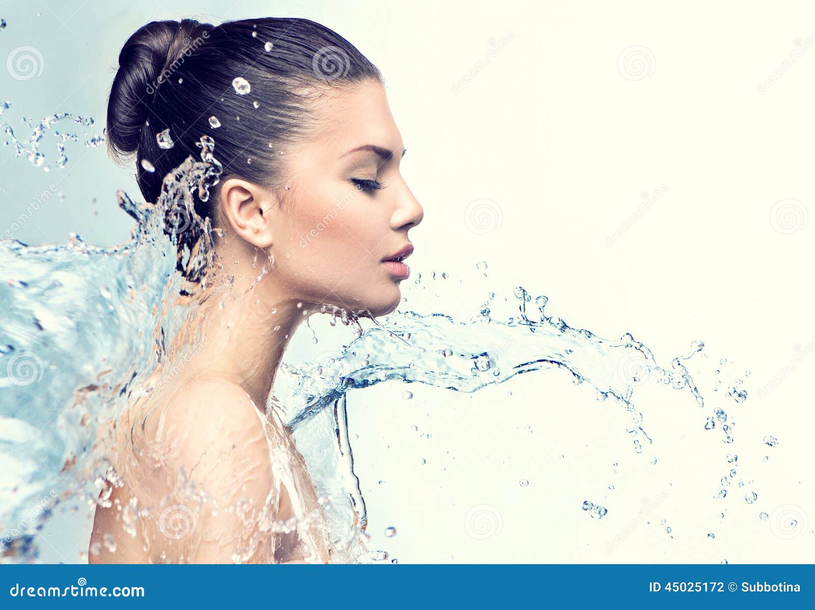 beautiful model woman with splashes of water