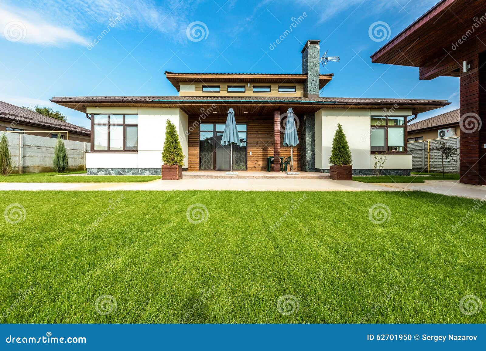 Beautiful Modern House in Cement, View from the Garden Stock Photo