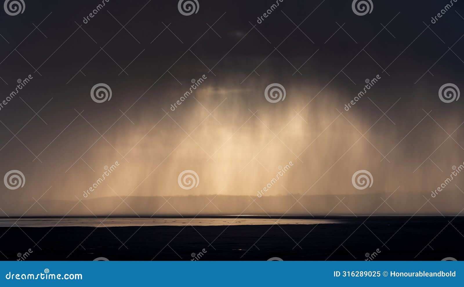 beautiful moody storm skies over ocean landscape with distant heavy rainfall