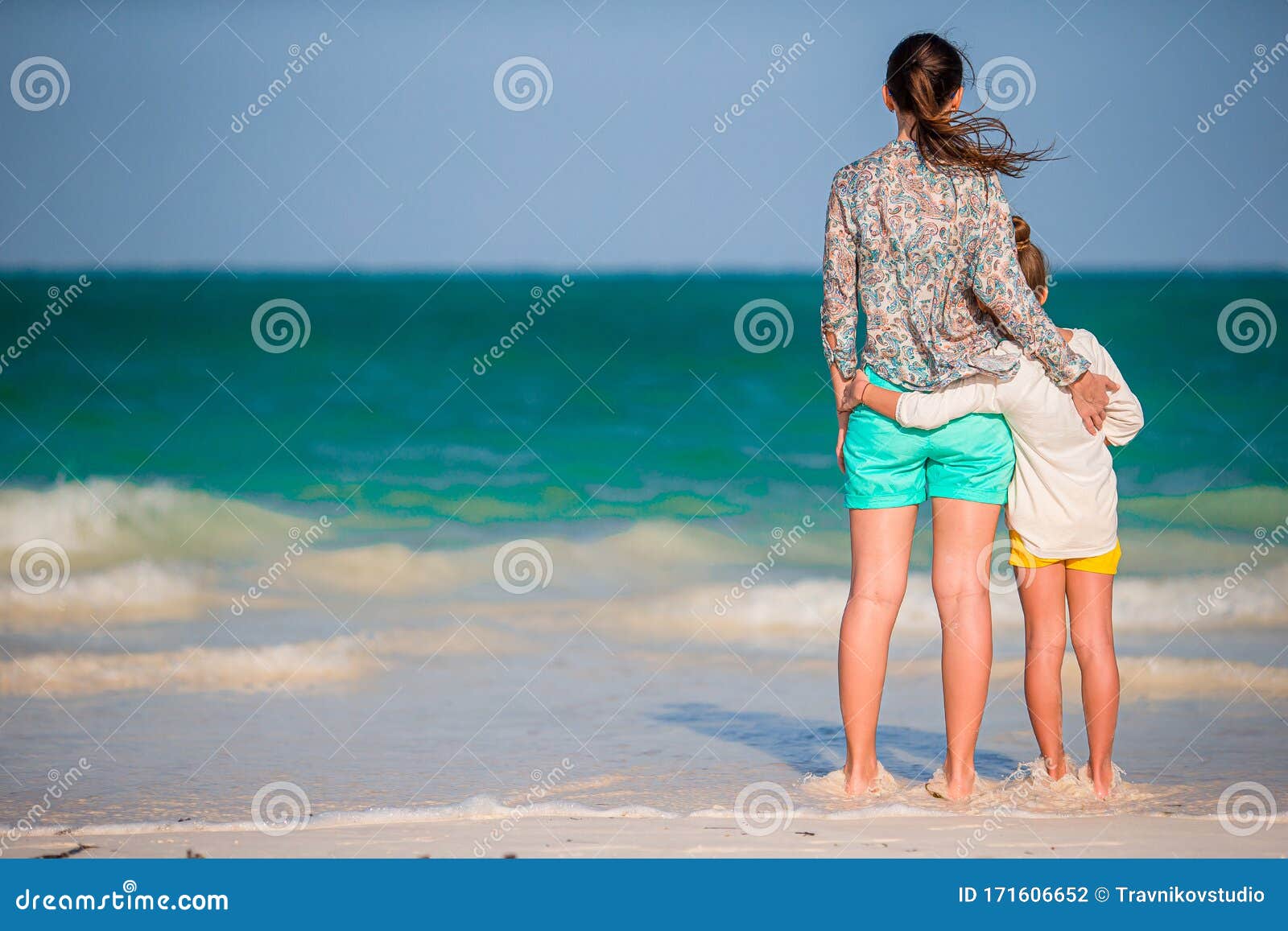 Beautiful Mother And Daughter At Caribbean Beach Enjoying Summer 