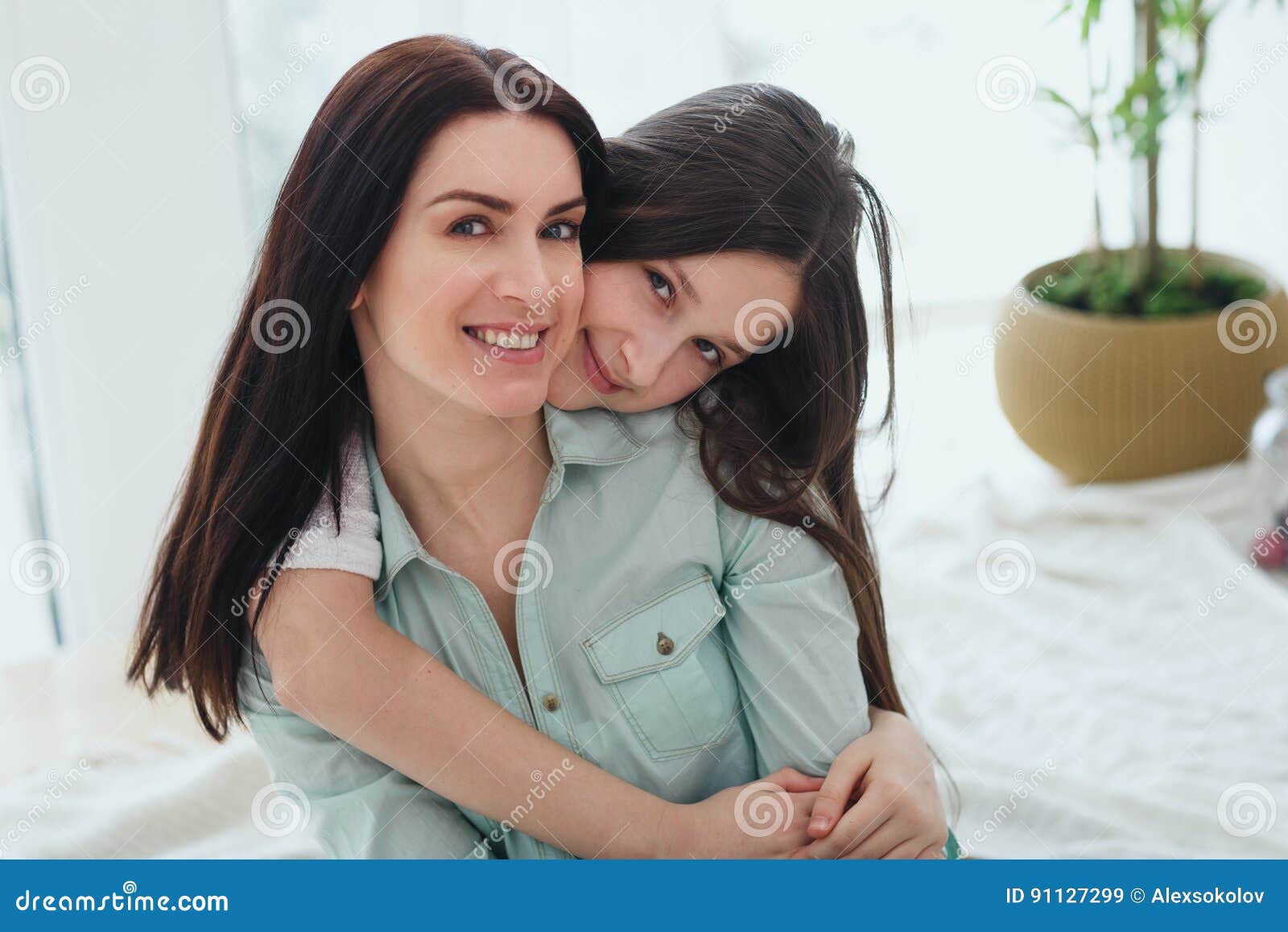 Beautiful Mother And Her Cute Daughter Smiling And Posing At Home Stock Image Image Of Mature 