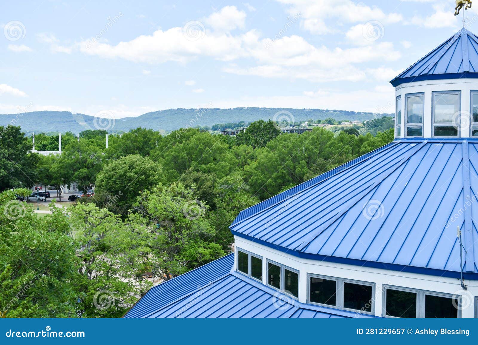 Beautiful Mountain Skyline with Blue Roof Building Stock Image Image