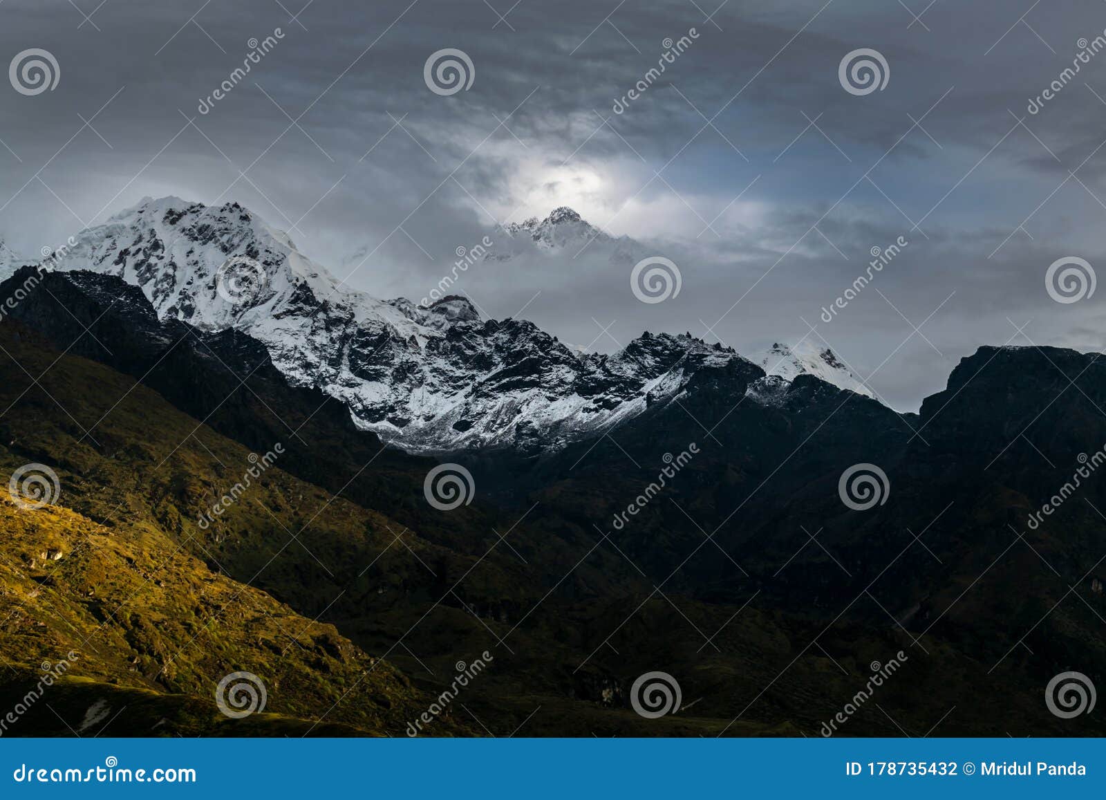 a beautiful mountain view with fog and clouds