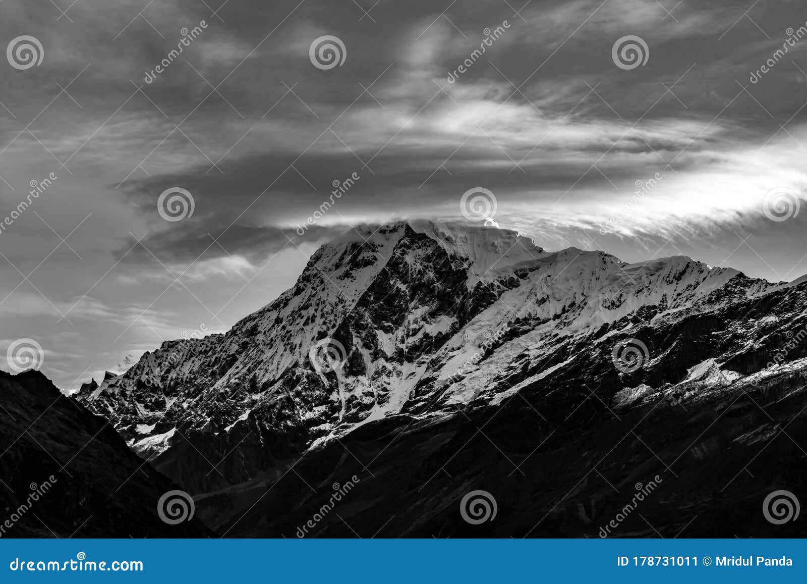 a beautiful mountain view with fog and clouds