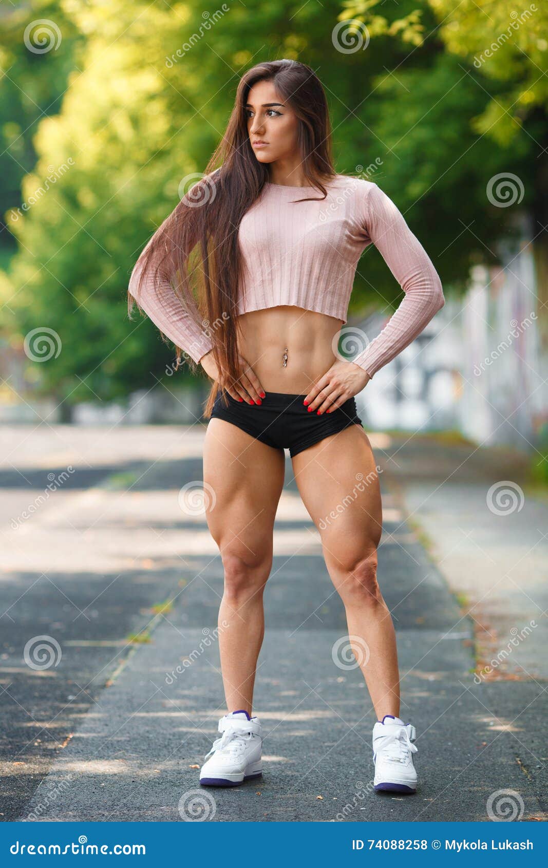 Beautiful Muscular Girl Posing Outdoor Athletic Woman With Big Quads 