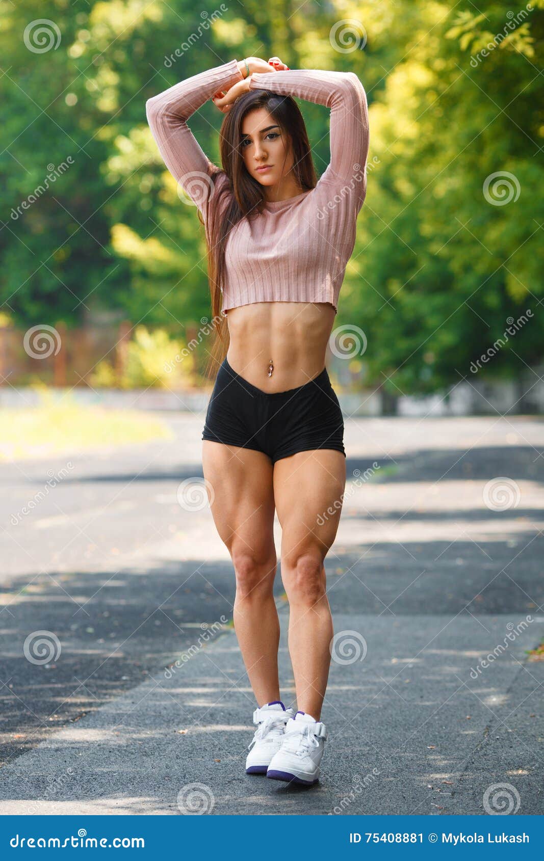 Beautiful Muscular Girl Posing Outdoor. Athletic Woman with Big Quads Stock  Image - Image of muscle, athlete: 75408881