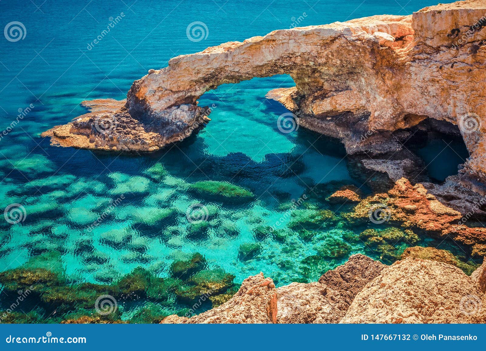 beautiful natural rock arch near of ayia napa, cavo greco and protaras on cyprus island, mediterranean sea. legendary bridge