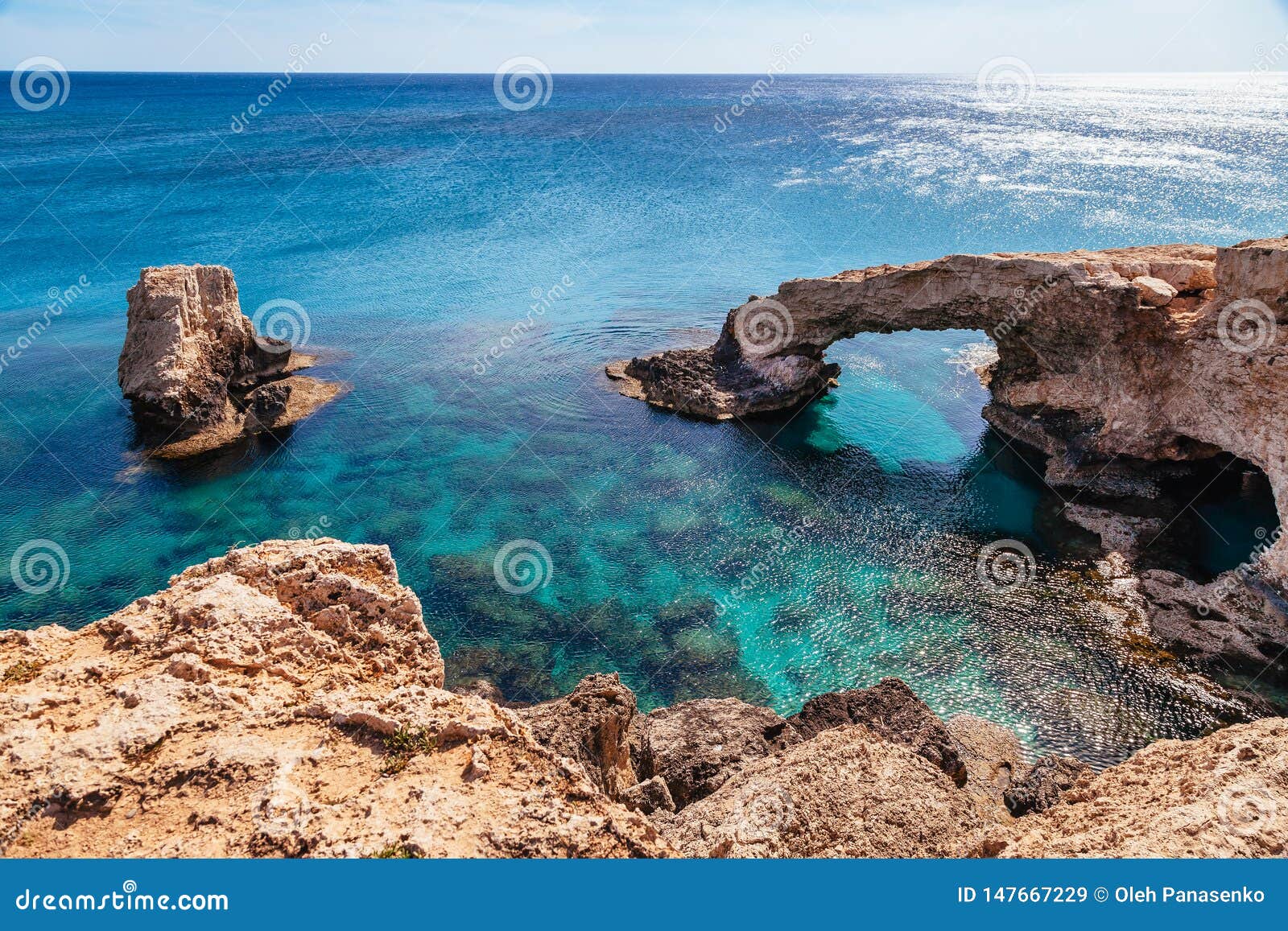 beautiful natural rock arch near of ayia napa, cavo greco and protaras on cyprus island, mediterranean sea. legendary bridge