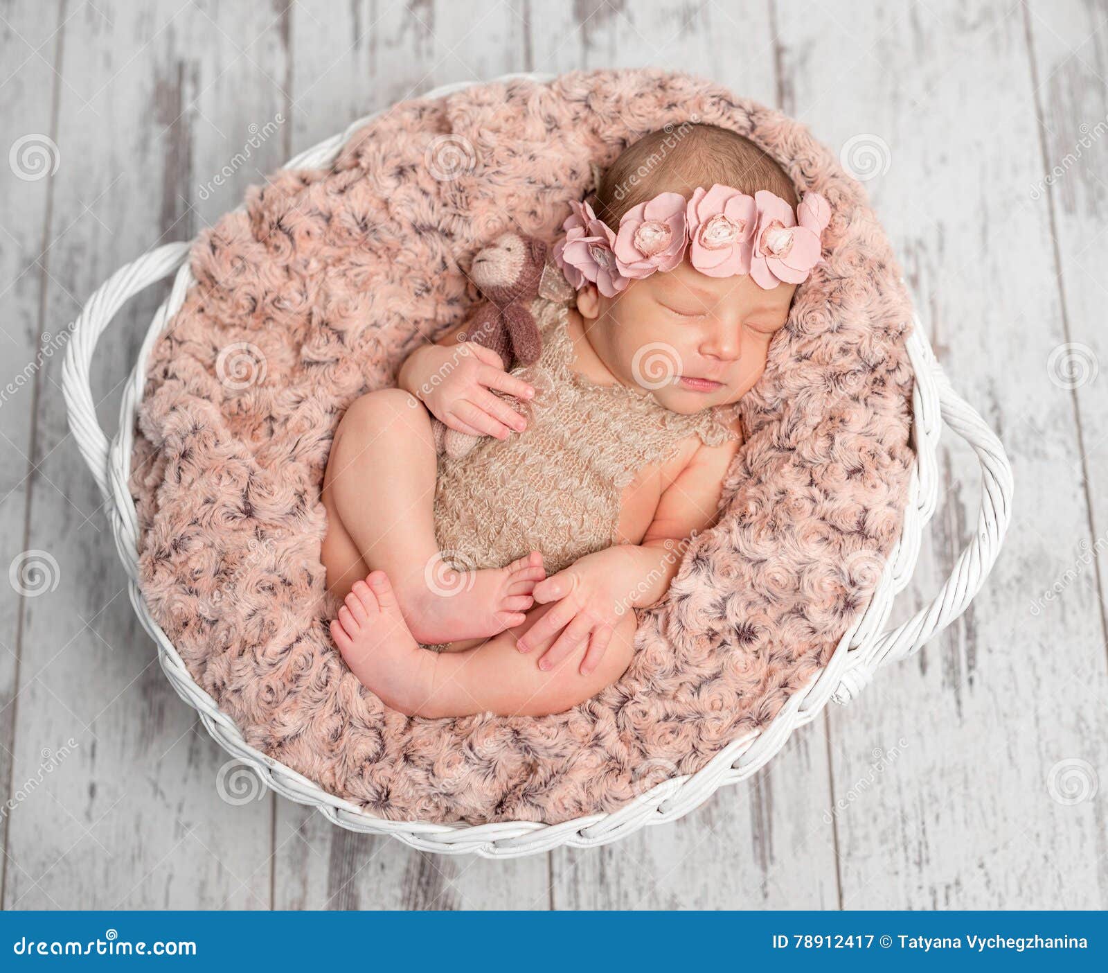 newborn in basket