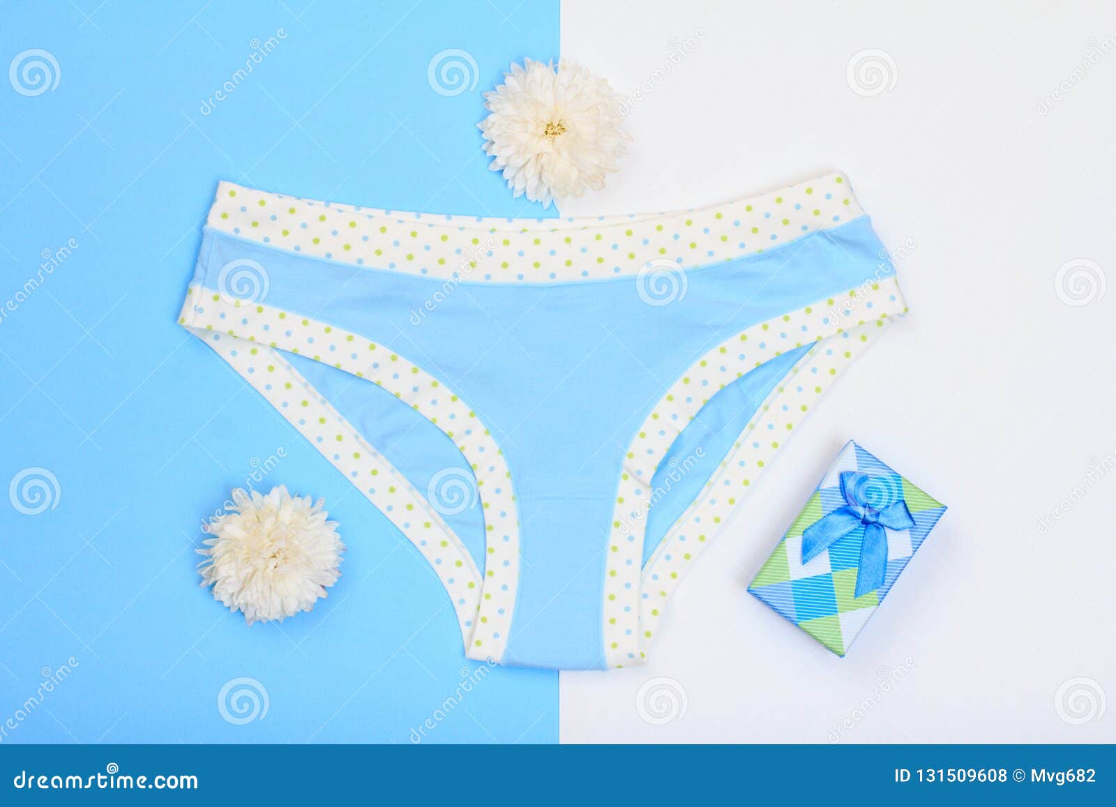 Beautiful Panties with Gift Box and Flowers on Blue and White