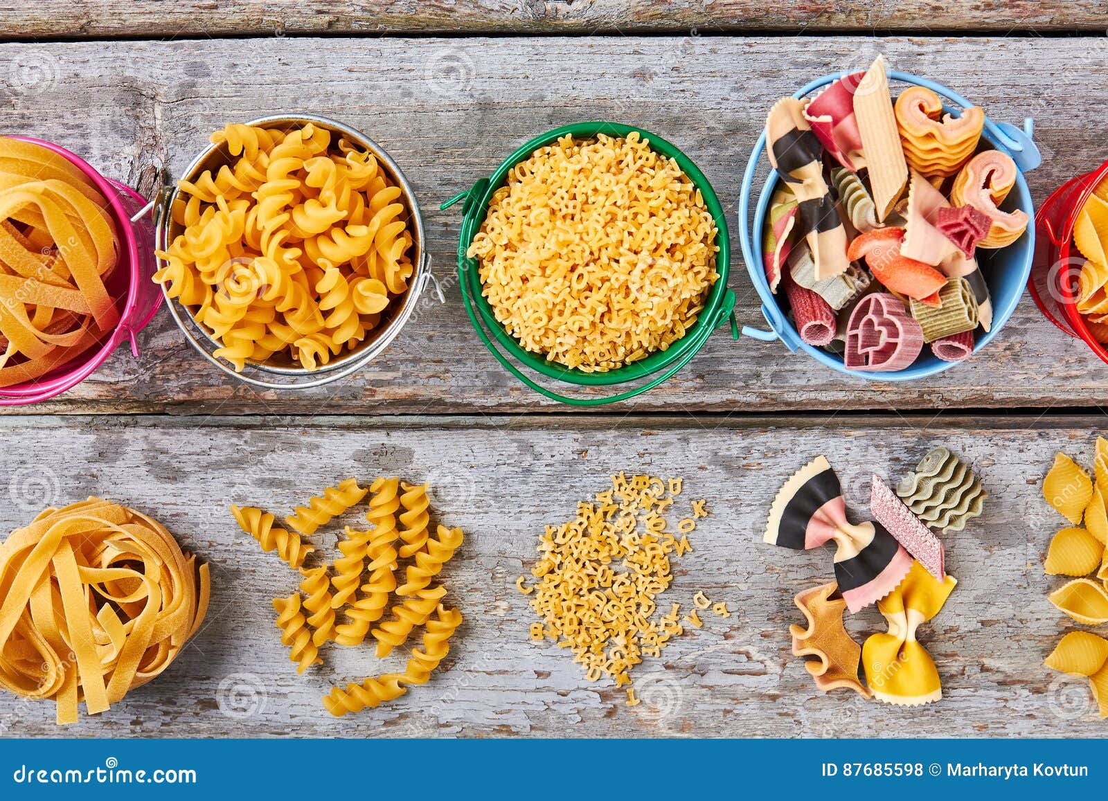 Beautiful Pasta in Colored Buckets. Stock Photo Image of design, heap