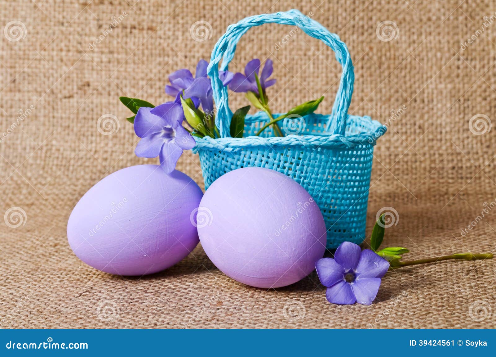 Beautiful Periwinkle in the Basket and Easter Eggs Stock Image Image