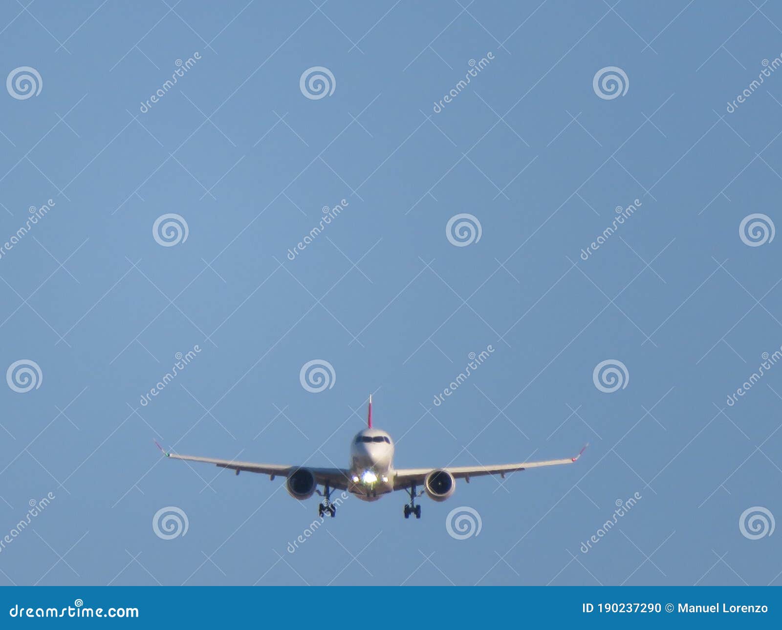 beautiful photo of a plane landing at the airport taking land