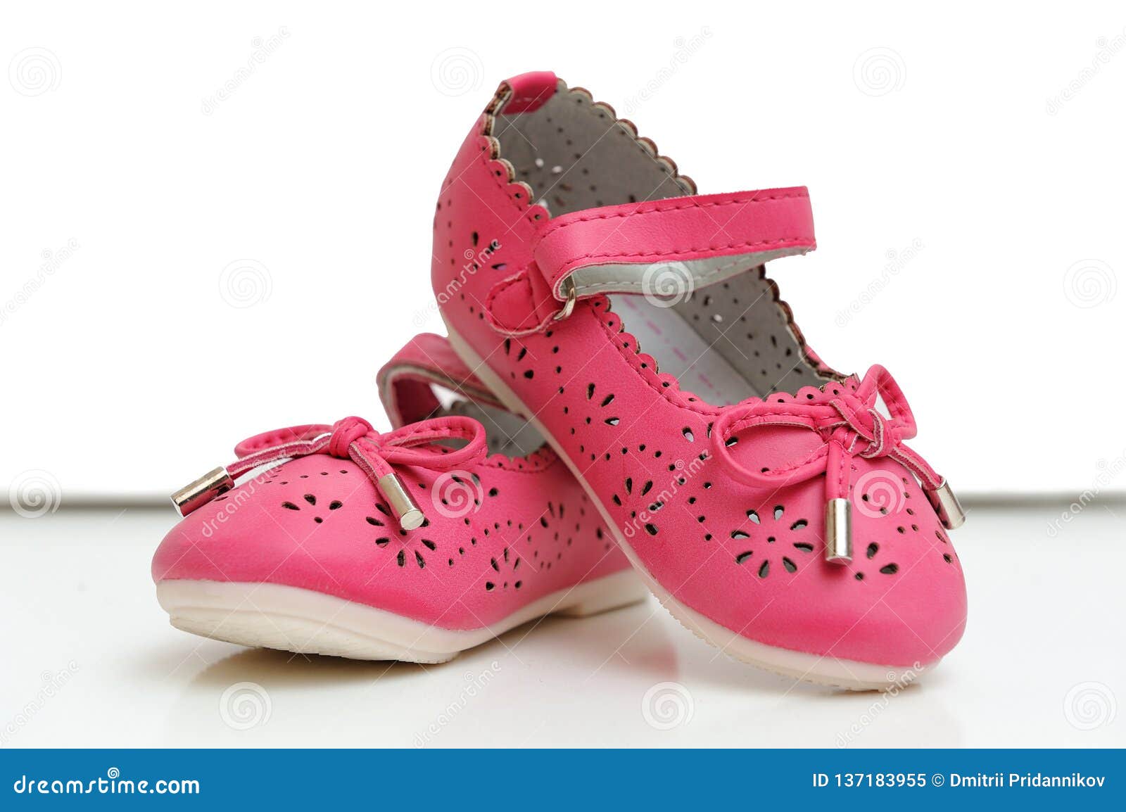 Beautiful Pink Baby Shoes on a White Background Stock Image - Image of ...