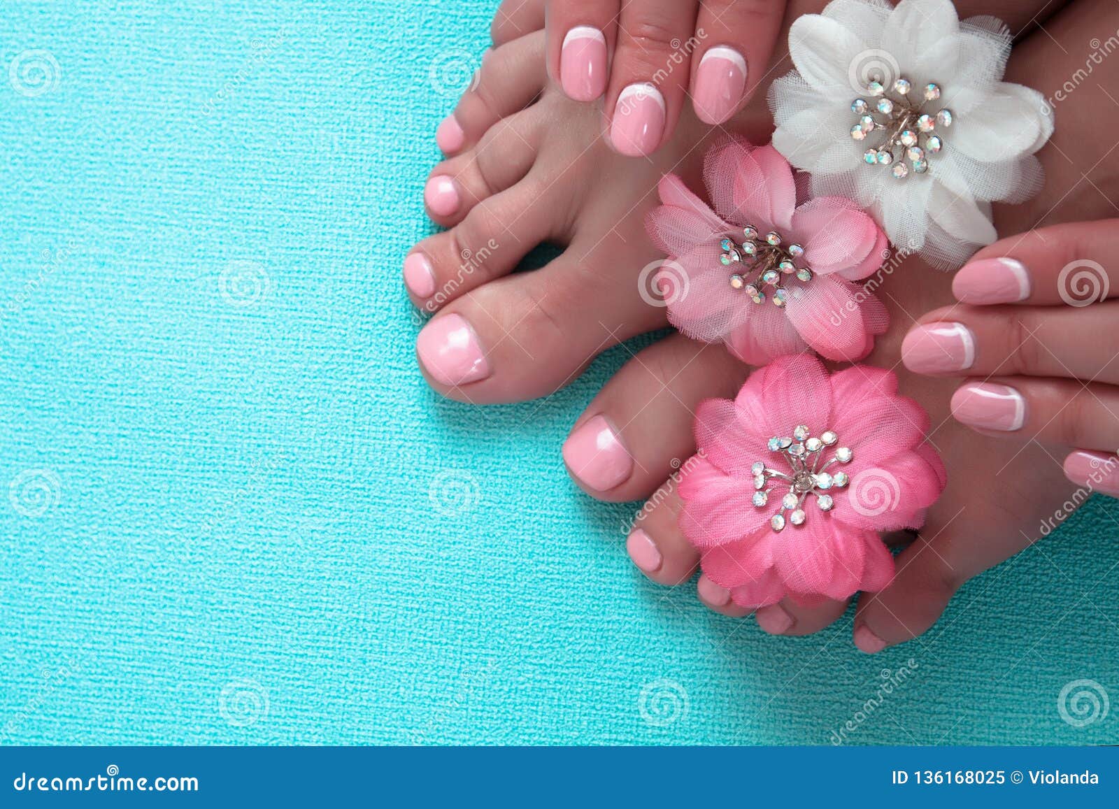 beautiful pink manicure and pedicure with flowers