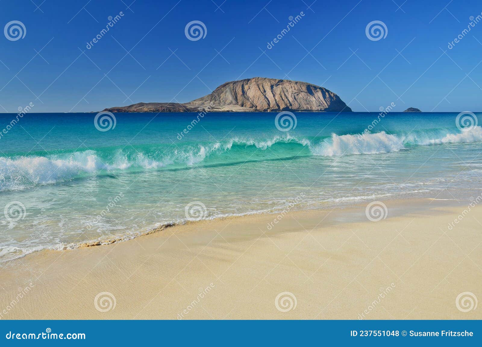 beautiful playa de las conchas with montana clara in the background. the island la graciosa, belonging to lanzarote, canary