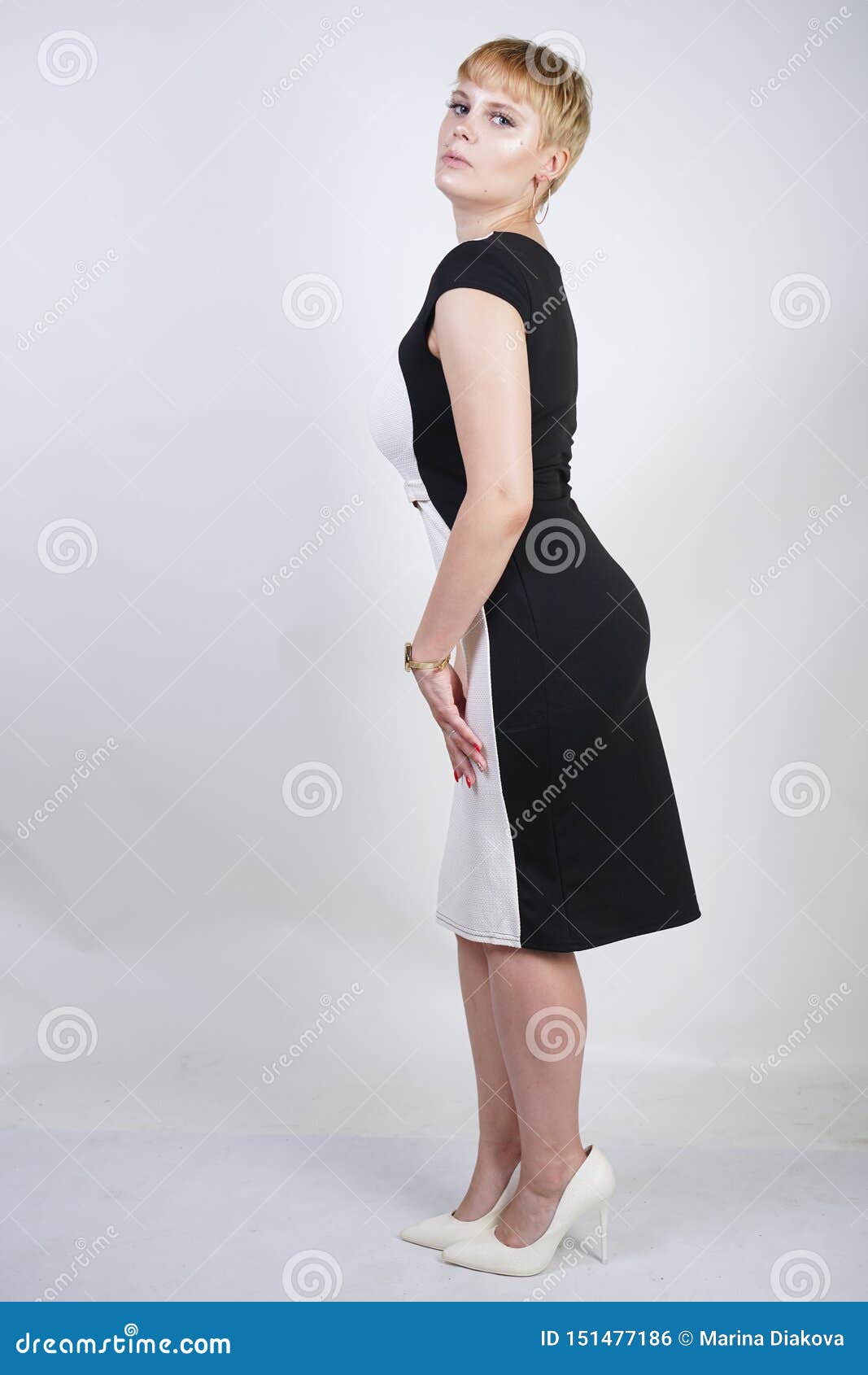 Beautiful Plus Size Blonde Girl with Short Hair in a Fashionable Office  Dress on a White Background in the Studio. Stylish Young W Stock Photo -  Image of designer, business: 151477186