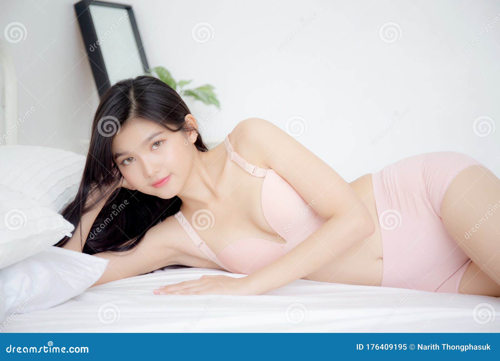 Happy Young Adorable Slim Woman in Underwear Isolated Over Gray