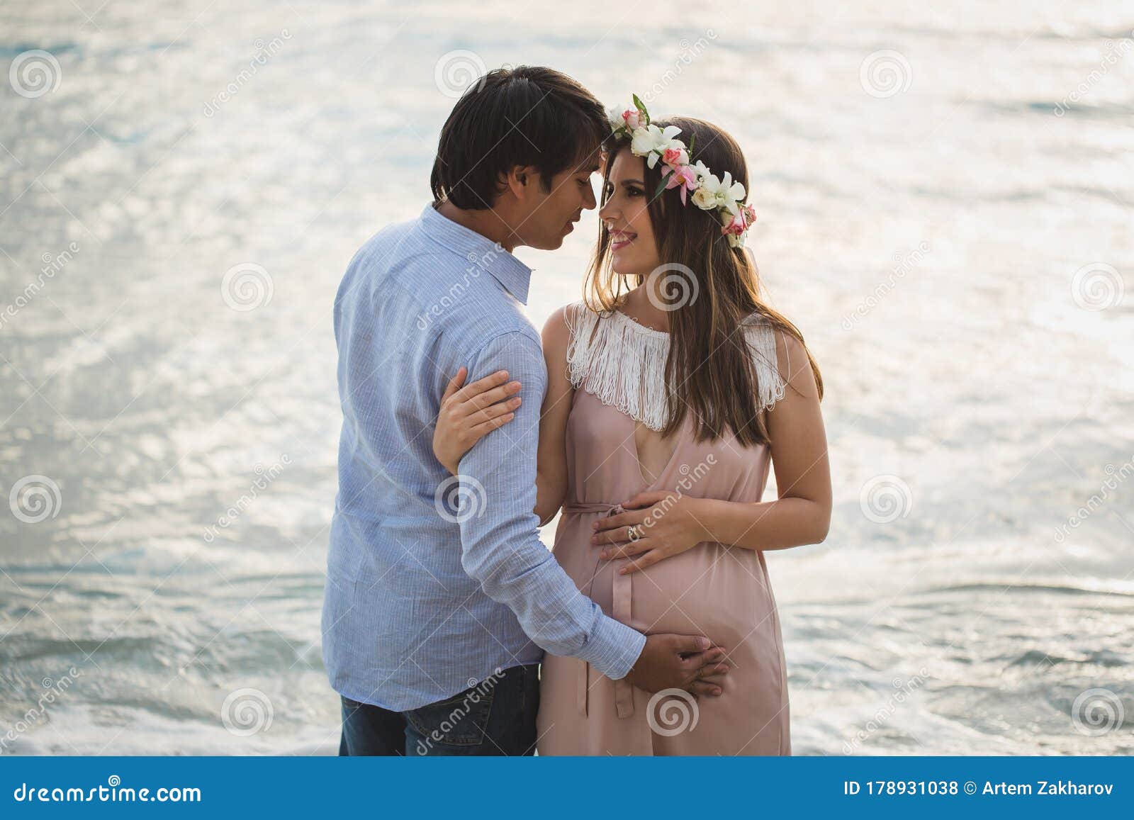 Beautiful Pregnant Girl And Man On The Beach. Stock Photo ...