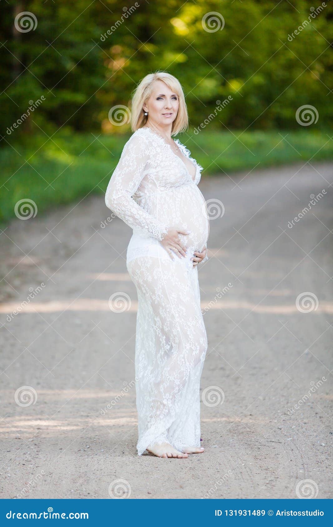 Beautiful Pregnant Woman in Sheer Long Lacy White Maternity Dress Looking  Dreamy on Lonely Road in Forest Stock Image - Image of dress, expecting:  131931489