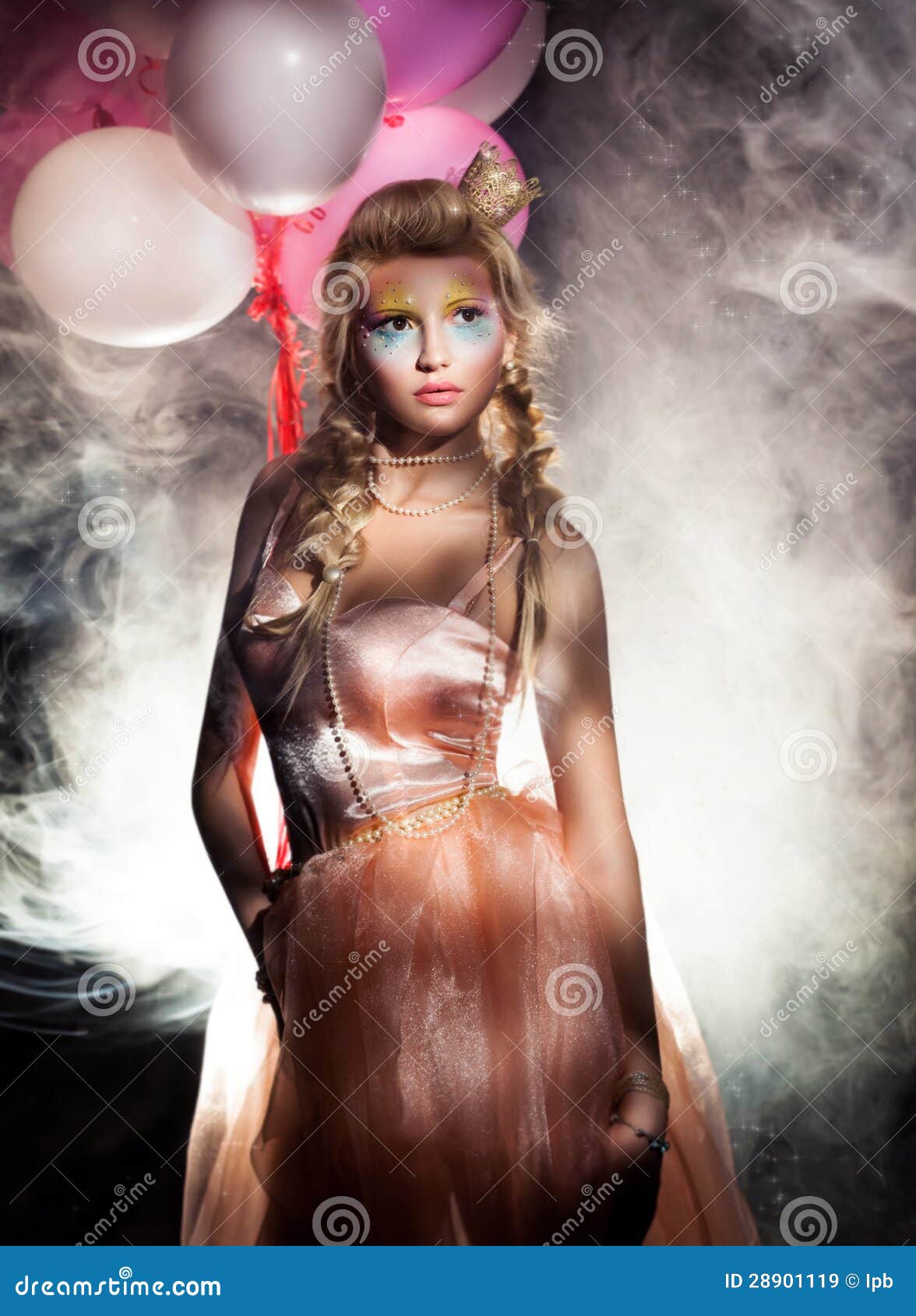 beautiful princess in pink dress with golden crown. haze
