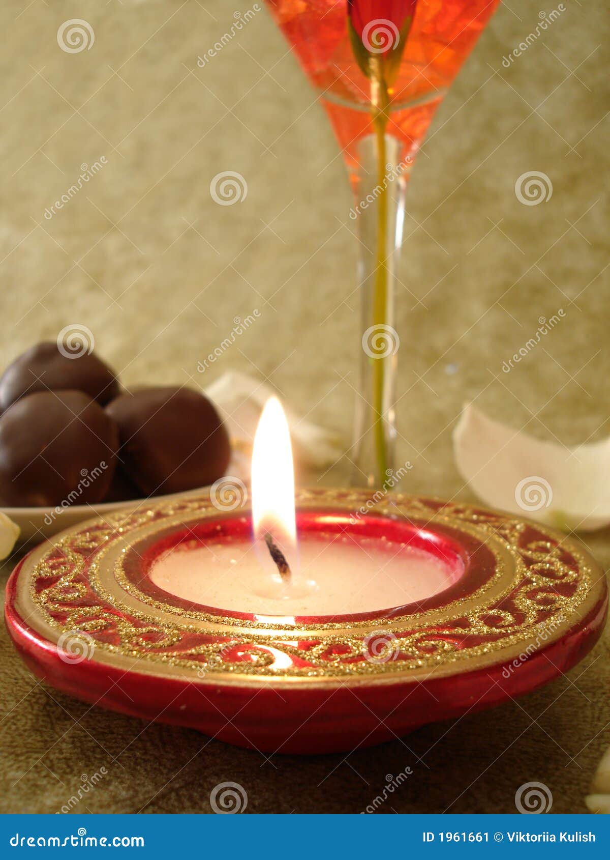 Beautiful Red Candle And Glass, Sweets On A Background Stock Image