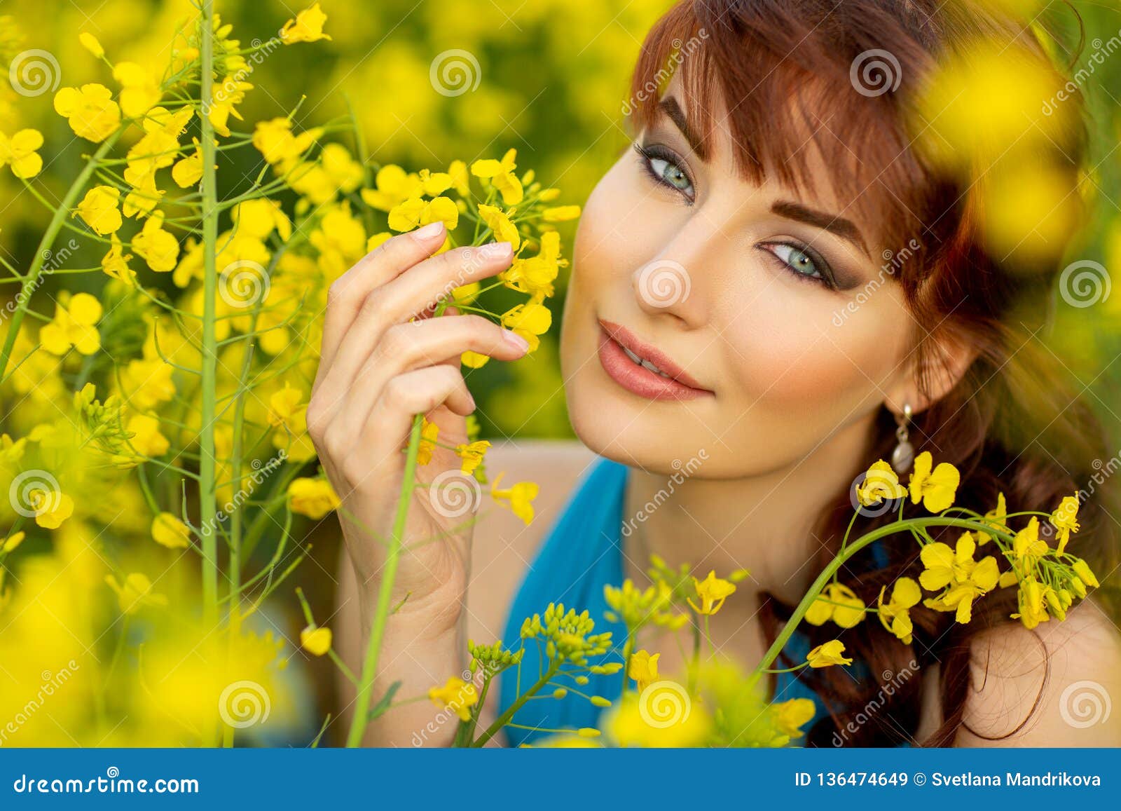 Beautiful Girl in Blue Dress with Yellow Flowers Stock Image - Image of ...