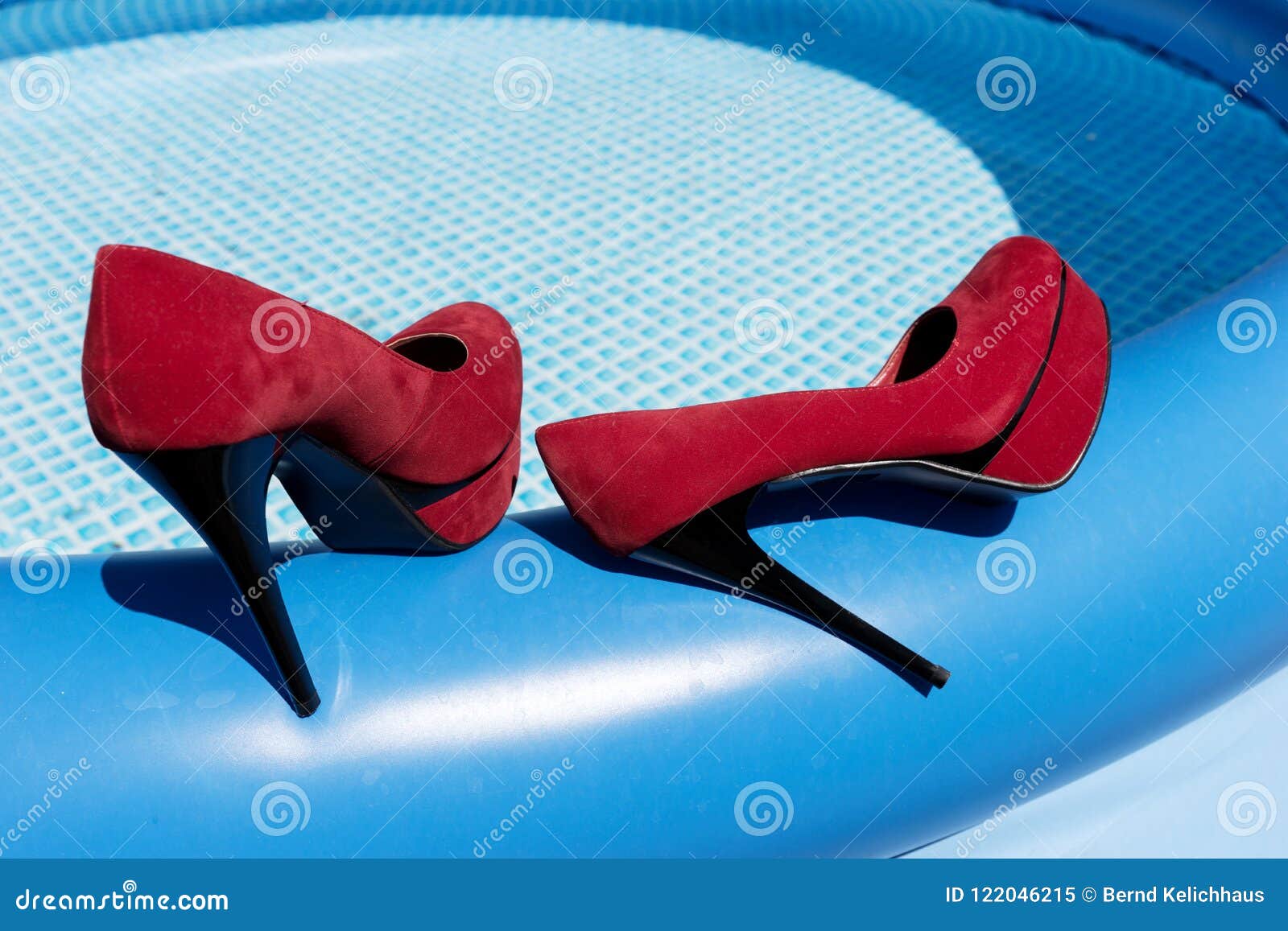 Red High Heels on the Edge of the Swimming Pool Stock Image - Image of ...
