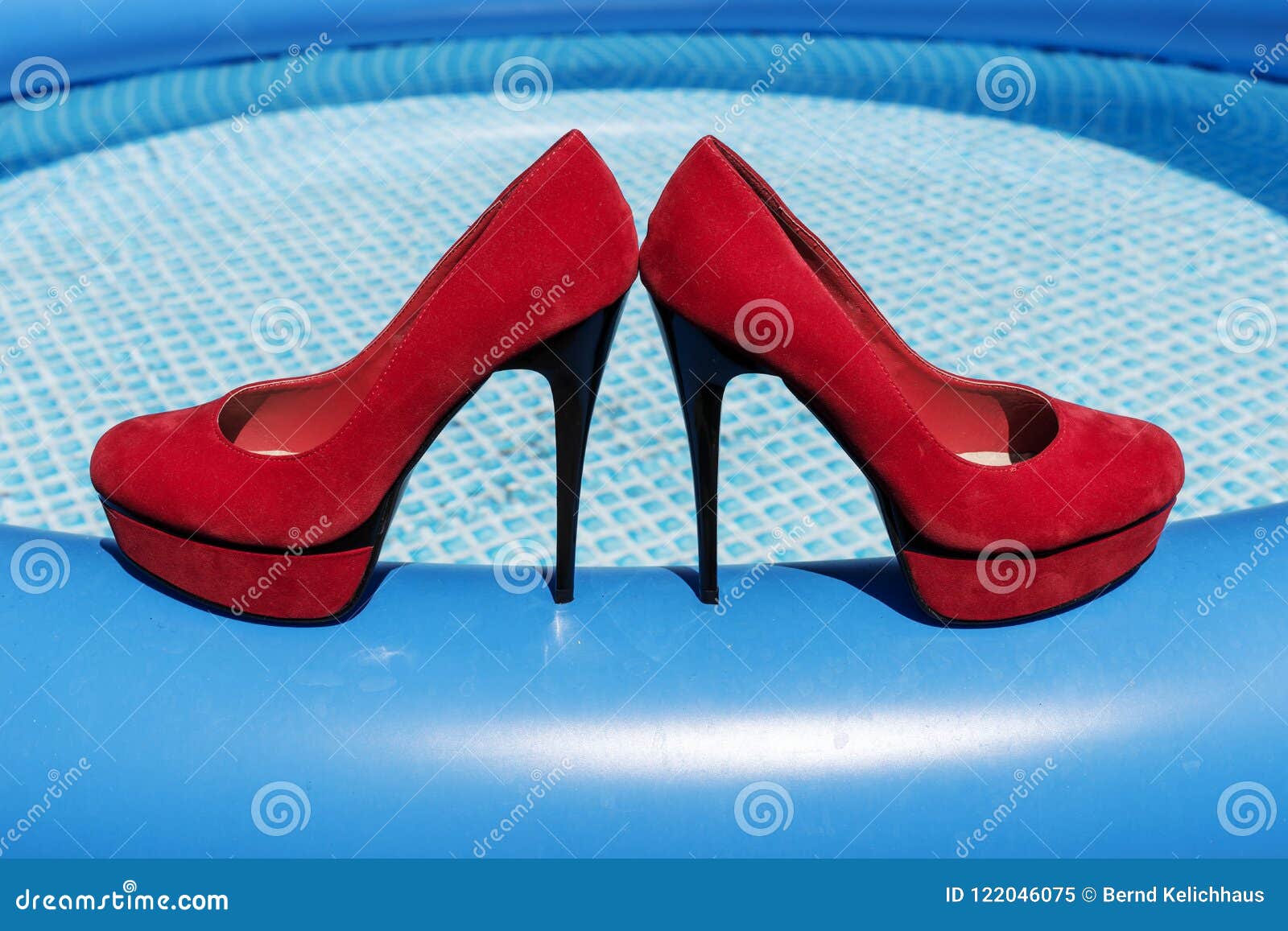 Red High Heels on the Edge of the Swimming Pool Stock Image - Image of ...