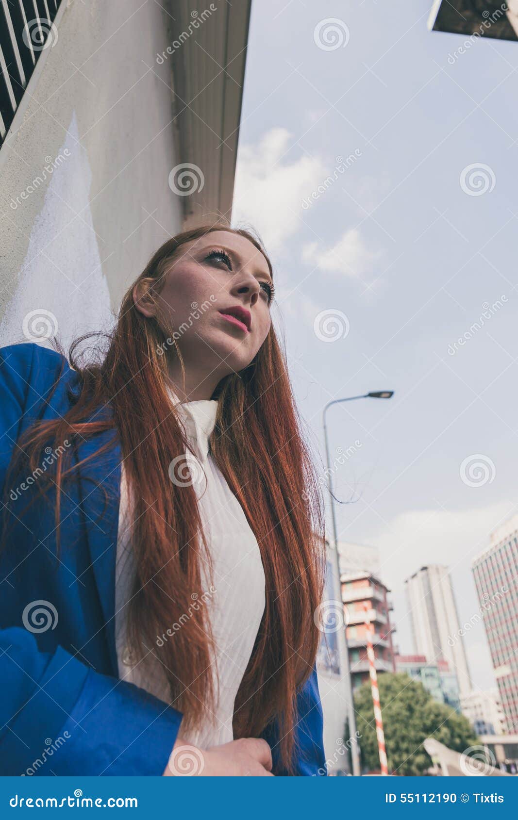 Beautiful Redhead Girl Posing In An Urban Context Stock