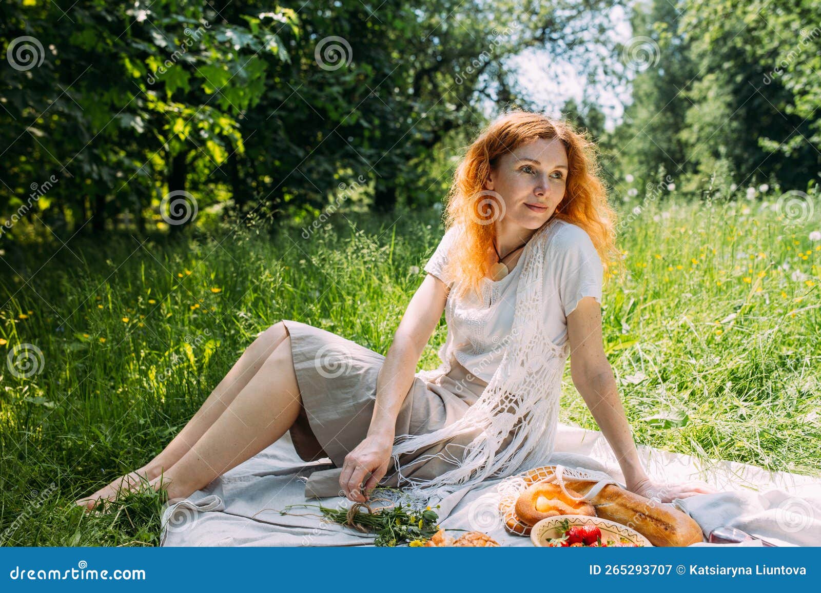 Beautiful Redhead Woman On Picnic She Smiles Eat Strawberrie And Enjoys Summer Stock Image