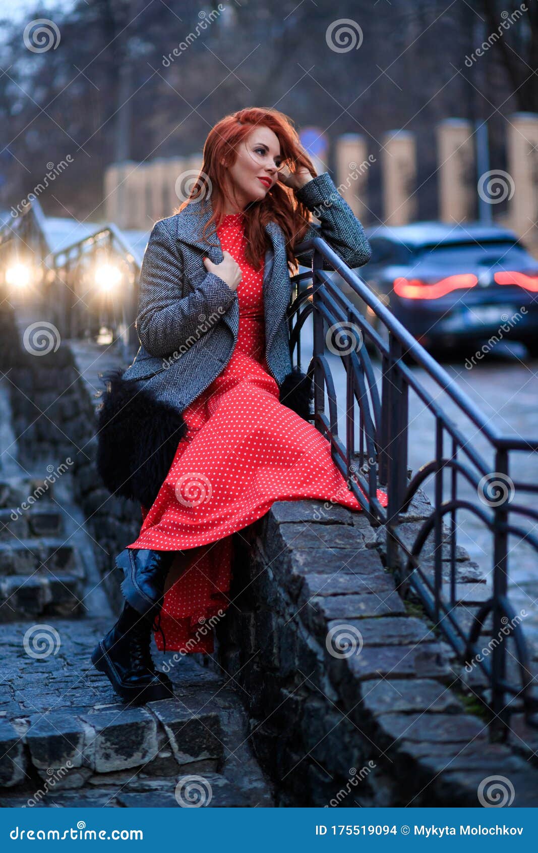 Beautiful Redhead Woman Wearing Red Dress and Stylish Coat on City ...