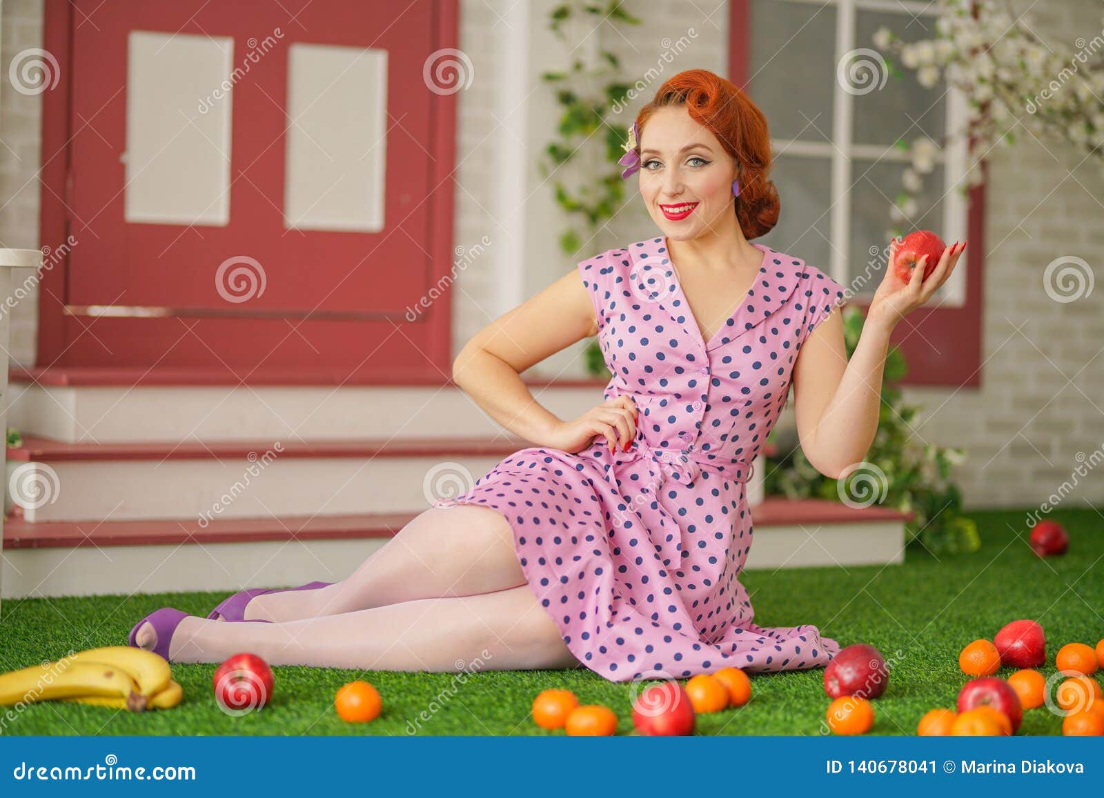 Beautiful Redheaded Pin Up Girl In Pink Polka Dot Dress