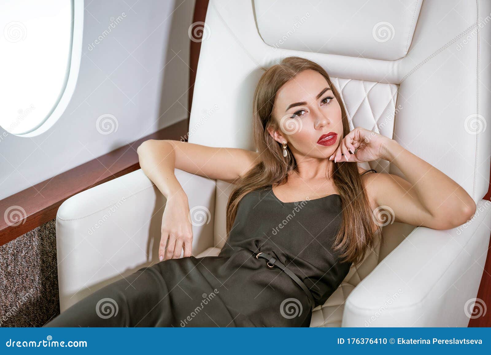 My Beautiful And Wealthy Wife Beautiful Rich Woman in a Private First Class Plane Stock Photo - Image