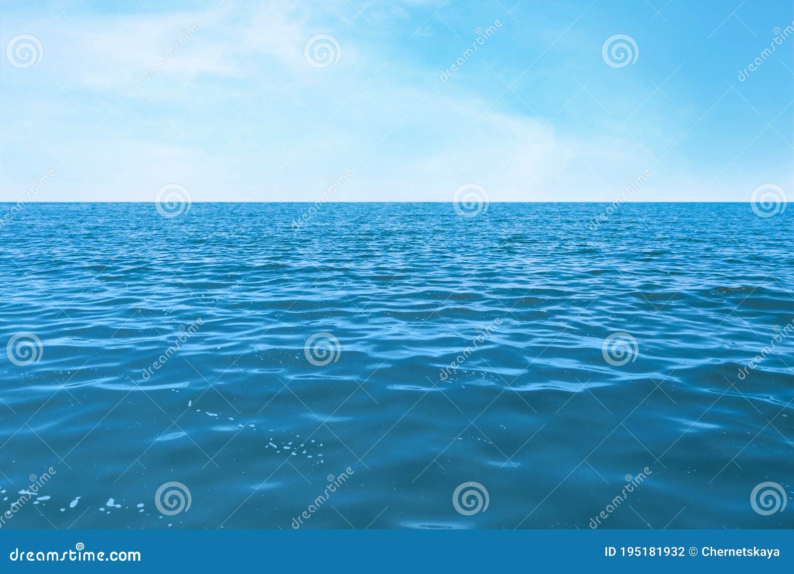 beautiful ripply sea under sky with clouds