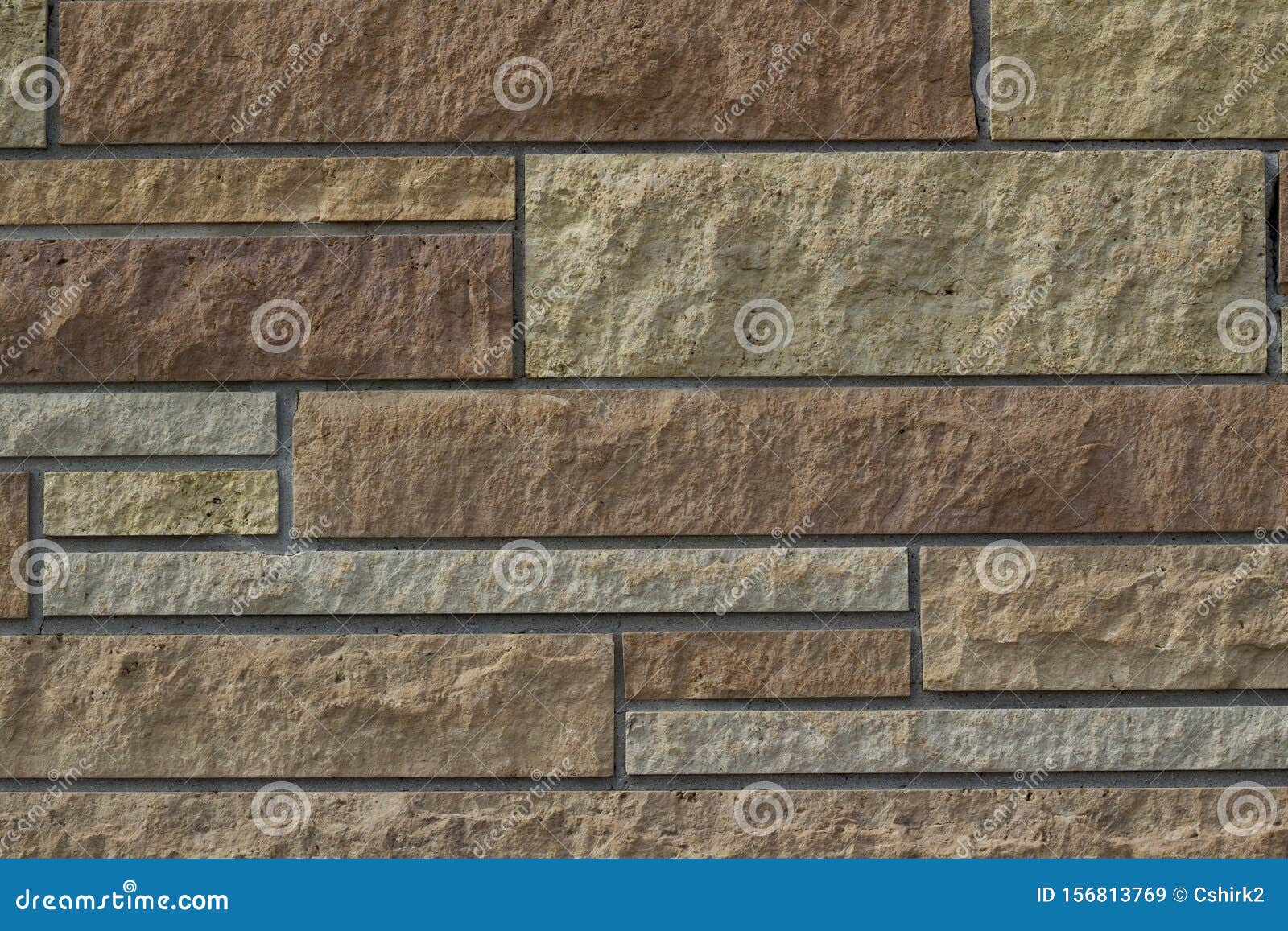 beautiful limestone brick wall texture with stone blocks in varying sizes and shades of brown