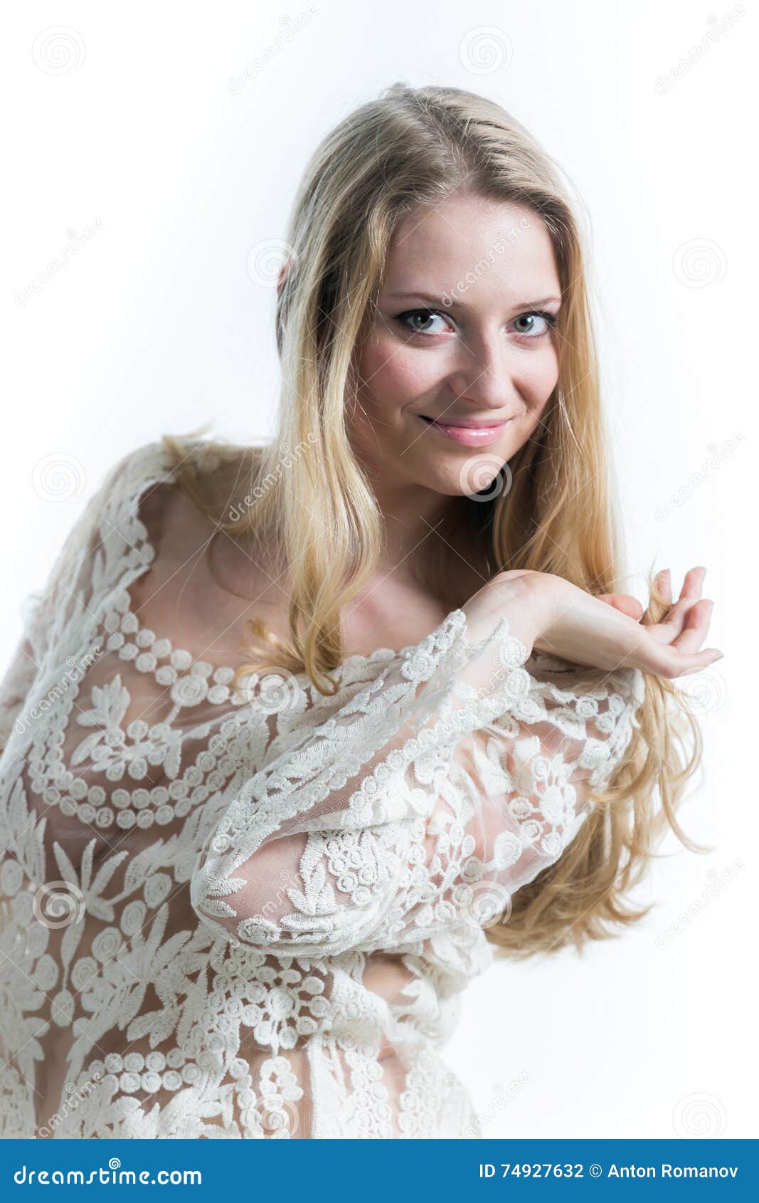 Beautiful Russian Blonde Girl On A White Background In A White