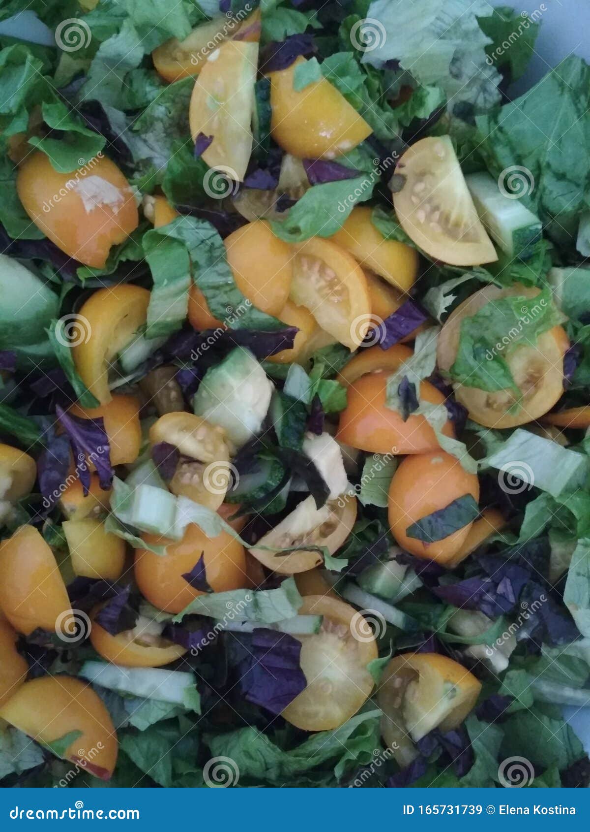 Beautiful Salad of Orange Tomato, Onion, Green Salad, Cucumber and ...