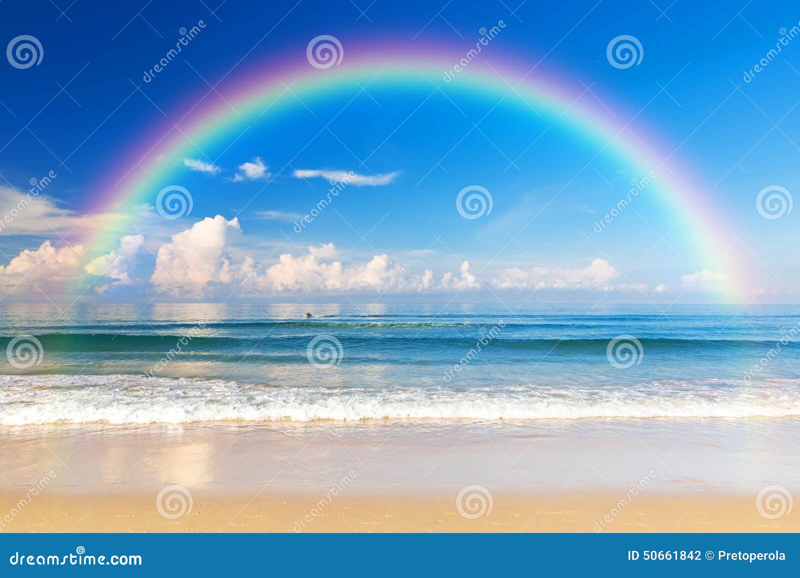 beautiful sea with a rainbow in the sky