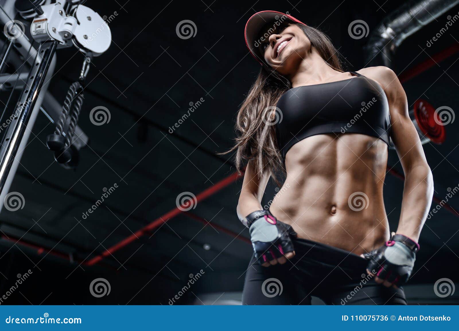Athletic Young Girl Training Abs in Gym Stock Photo - Image of