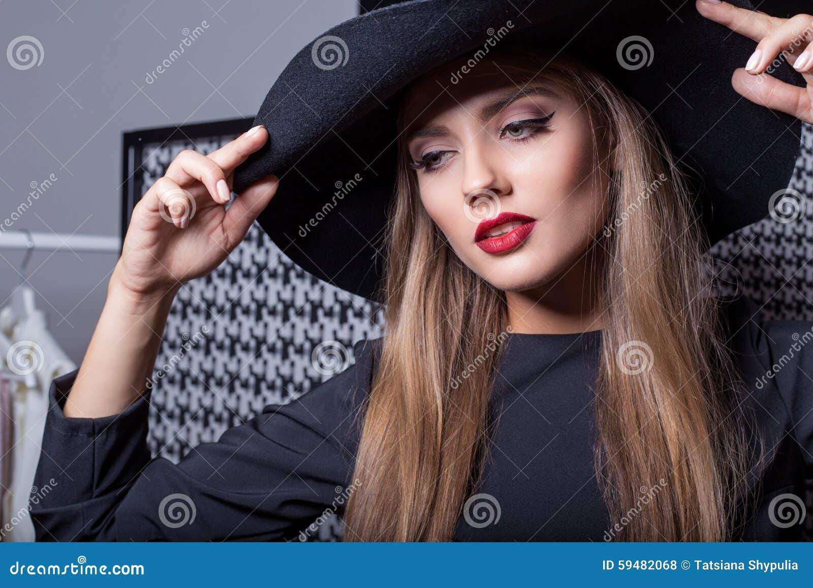 Beautiful Attractive Girl in a Black Hat with Red Lipstick in Fashion ...