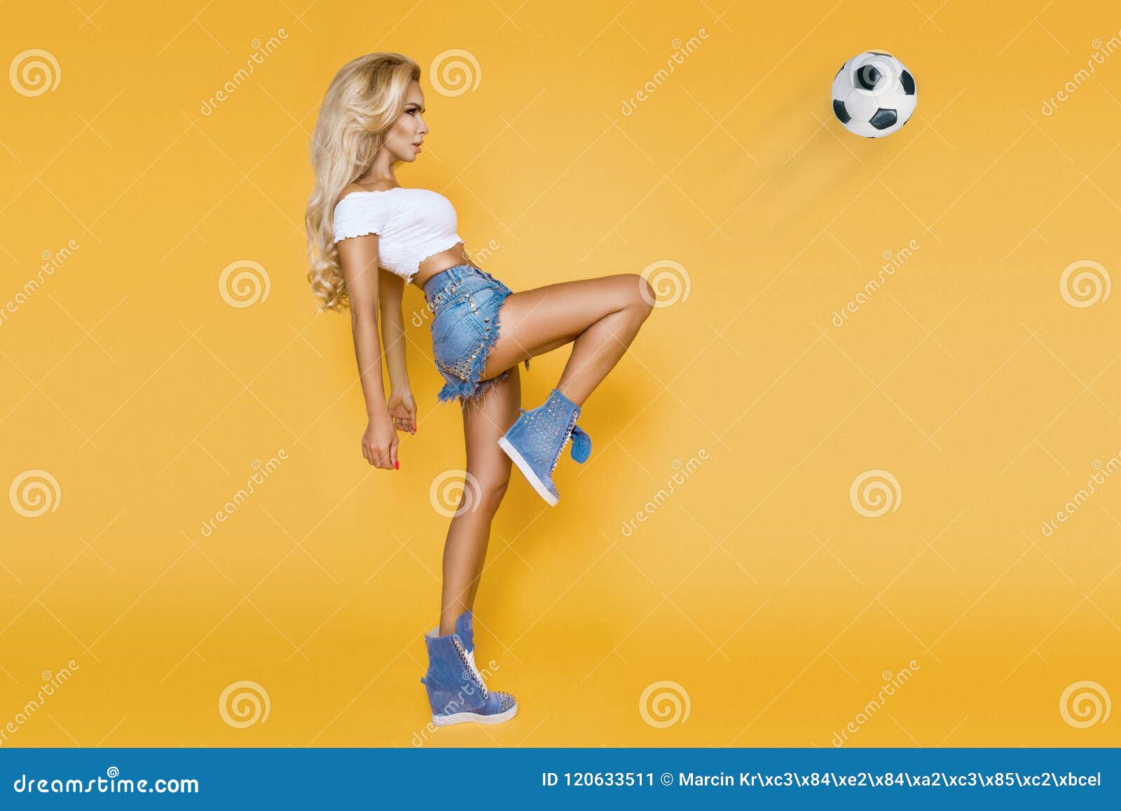 Beautiful Blond Woman Dressed In Sports Clothing Playing Football Stock Image Image Of